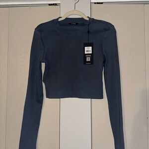 NWT Cuts Women Blue Long Sleeve Crop Top. Size Medium